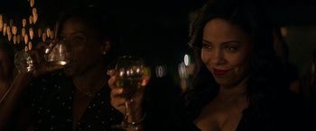 Movie still from “The Perfect Guy” (2015), directed by David M. Rosenthal – A woman holding a wine glass in front of another woman; Close Up shot, Over the shoulder angle