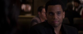 Movie still from “The Perfect Guy” (2015), directed by David M. Rosenthal – A person wearing a suit and tie; Close Up shot, Over the shoulder angle