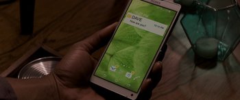 Movie still from “The Perfect Guy” (2015), directed by David M. Rosenthal – A person is holding a smart phone in their hand; Extreme Close Up shot, Overhead angle