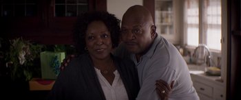 Movie still from “The Perfect Guy” (2015), directed by David M. Rosenthal – A man and a woman posing for a picture; Medium shot, Low angle