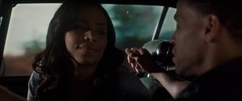 Movie still from “The Perfect Guy” (2015), directed by David M. Rosenthal – A woman sitting in the driver's seat of a car; Close Up shot, Over the shoulder angle