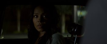 Movie still from “The Perfect Guy” (2015), directed by David M. Rosenthal – A woman sitting in front of a mirror in a dark room; Close Up shot, Over the shoulder angle