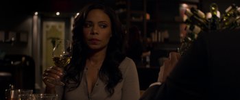 Movie still from “The Perfect Guy” (2015), directed by David M. Rosenthal – A woman sitting at a table in a restaurant; Close Up shot, Over the shoulder angle