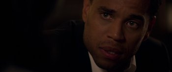 Movie still from “The Perfect Guy” (2015), directed by David M. Rosenthal – A person wearing a suit and tie; Close Up shot, Over the shoulder angle