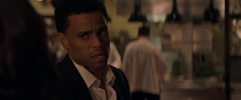 Movie still from “The Perfect Guy” (2015), directed by David M. Rosenthal – A person wearing a suit and tie; Close Up shot, Over the shoulder angle