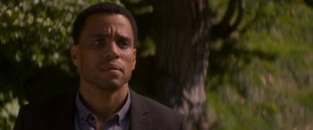 Movie still from “The Perfect Guy” (2015), directed by David M. Rosenthal – A person wearing a suit and tie; Close Up shot, Over the shoulder angle