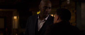 Movie still from “The Perfect Guy” (2015), directed by David M. Rosenthal – A man wearing a suit and tie talking to another man; Close Up shot, Over the shoulder angle