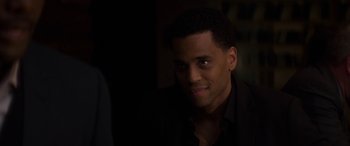 Movie still from “The Perfect Guy” (2015), directed by David M. Rosenthal – A person wearing a suit and tie; Close Up shot, Over the shoulder angle