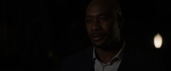 Movie still from “The Perfect Guy” (2015), directed by David M. Rosenthal – A man in a black suit and a white shirt; Close Up shot, Over the shoulder angle