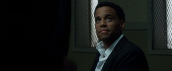 Movie still from “The Perfect Guy” (2015), directed by David M. Rosenthal – A man in a black suit and a white shirt; Close Up shot, Over the shoulder angle