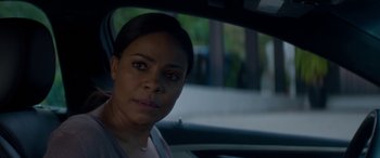 Movie still from “The Perfect Guy” (2015), directed by David M. Rosenthal – A woman sitting in the driver's seat of a car; Close Up shot, Over the shoulder angle