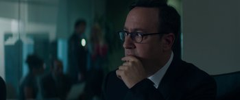 Movie still from “The Perfect Guy” (2015), directed by David M. Rosenthal – A person wearing a suit and glasses; Close Up shot, Over the shoulder angle
