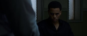 Movie still from “The Perfect Guy” (2015), directed by David M. Rosenthal – A man in a black shirt looking at himself in the mirror; Close Up shot, Over the shoulder angle