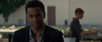 Movie still from “The Perfect Guy” (2015), directed by David M. Rosenthal – A person wearing a suit and tie; Close Up shot, Over the shoulder angle
