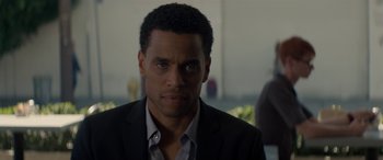 Movie still from “The Perfect Guy” (2015), directed by David M. Rosenthal – A person wearing a suit and tie; Close Up shot, Over the shoulder angle
