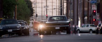Movie still from “The Perfect Guy” (2015), directed by David M. Rosenthal – A car is parked on the side of the street; Wide shot, Low angle