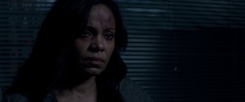 Movie still from “The Perfect Guy” (2015), directed by David M. Rosenthal – A woman with bruises on her face and head; Close Up shot, Over the shoulder angle