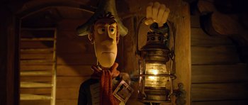 Movie still from “The Pirates! Band of Misfits” (2012), directed by Jeff Newitt – A statue of a man holding an old fashioned lamp; Close Up shot, Low angle