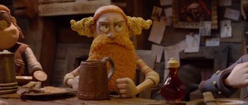 Movie still from “The Pirates! Band of Misfits” (2012), directed by Jeff Newitt – An image of a gnome sitting at a table; Close Up shot, Over the shoulder angle