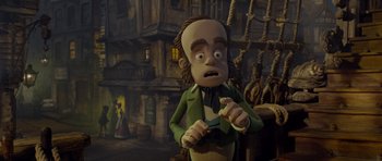 Movie still from “The Pirates! Band of Misfits” (2012), directed by Jeff Newitt – A cartoon of a man in a green jacket and black tie; Medium shot, Over the shoulder angle