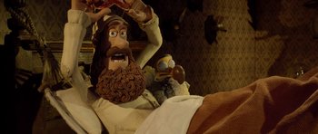 Movie still from “The Pirates! Band of Misfits” (2012), directed by Jeff Newitt – View of a statue of a man with a beard; Close Up shot, Low angle