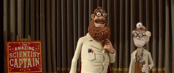Movie still from “The Pirates! Band of Misfits” (2012), directed by Jeff Newitt – A statue of a man with a long beard and glasses; Medium shot, Low angle