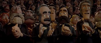 Movie still from “The Pirates! Band of Misfits” (2012), directed by Jeff Newitt – A group of people that are standing in a room; Close Up shot, Low angle