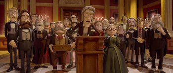 Movie still from “The Pirates! Band of Misfits” (2012), directed by Jeff Newitt – A group of people standing in a room; Wide shot, Low angle
