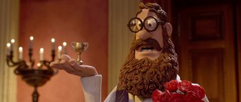 Movie still from “The Pirates! Band of Misfits” (2012), directed by Jeff Newitt – A man with a beard holding a trophy in front of him; Close Up shot, Over the shoulder angle