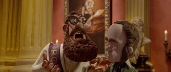 Movie still from “The Pirates! Band of Misfits” (2012), directed by Jeff Newitt – A man with a long beard and glasses is talking to another man with a long beard and glasses; Close Up shot, Over the shoulder angle