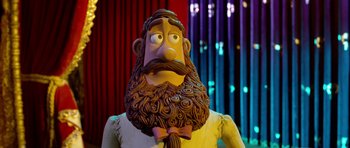 Movie still from “The Pirates! Band of Misfits” (2012), directed by Jeff Newitt – A statue of a man with a beard; Close Up shot, Over the shoulder angle