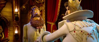Movie still from “The Pirates! Band of Misfits” (2012), directed by Jeff Newitt – A cake with a man on top of it; Close Up shot, Over the shoulder angle