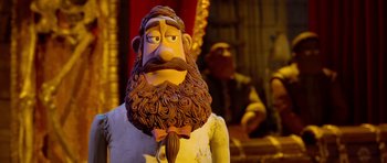 Movie still from “The Pirates! Band of Misfits” (2012), directed by Jeff Newitt – A statue of a man with a long beard; Close Up shot, Over the shoulder angle