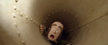Movie still from “The Pirates! Band of Misfits” (2012), directed by Jeff Newitt – A cartoon of a man in a hole with his mouth wide open; Close Up shot, Overhead angle