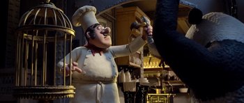 Movie still from “The Pirates! Band of Misfits” (2012), directed by Jeff Newitt – A man in a chef's outfit holding a knife in his hand; Medium shot, Low angle