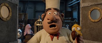 Movie still from “The Pirates! Band of Misfits” (2012), directed by Jeff Newitt – A statue of a man in a chef's outfit; Close Up shot, Low angle