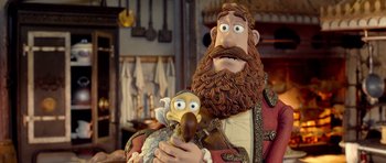 Movie still from “The Pirates! Band of Misfits” (2012), directed by Jeff Newitt – A statue of a man holding a bird; Close Up shot, Over the shoulder angle