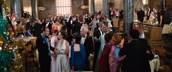 Movie still from “The Poseidon Adventure” (1972), directed by Ronald Neame – A group of people in formal wear at an event; Wide shot, High angle