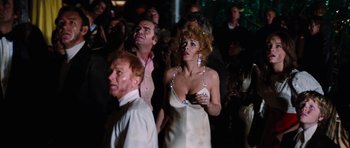 Movie still from “The Poseidon Adventure” (1972), directed by Ronald Neame – A group of people standing in a room; Medium shot, Low angle