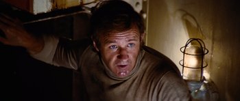 Movie still from “The Poseidon Adventure” (1972), directed by Ronald Neame – A person with blue eyes; Close Up shot, Low angle