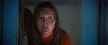 Movie still from “The Poseidon Adventure” (1972), directed by Ronald Neame – A woman with blue eyes stares into the camera; Close Up shot, Low angle