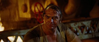 Movie still from “The Poseidon Adventure” (1972), directed by Ronald Neame – A person wearing a shirt; Close Up shot, High angle