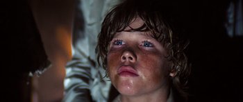 Movie still from “The Poseidon Adventure” (1972), directed by Ronald Neame – A child with blue eyes; Close Up shot, Low angle