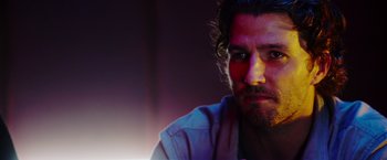 Movie still from “The Prince” (2014), directed by Brian A. Miller – A person wearing a shirt; Close Up shot, Low angle