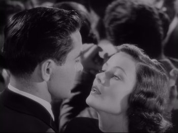Movie still from “The Razor's Edge” (1946), directed by Edmund Goulding – A man and a woman face to face in a black and white photo; Close Up shot, Low angle