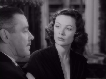 Movie still from “The Razor's Edge” (1946), directed by Edmund Goulding – A man and a woman are looking at one another; Close Up shot, Over the shoulder angle