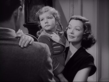 Movie still from “The Razor's Edge” (1946), directed by Edmund Goulding – A woman and a little girl sitting next to each other; Close Up shot, High angle
