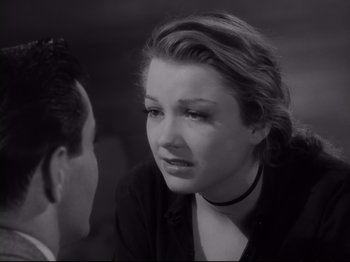 Movie still from “The Razor's Edge” (1946), directed by Edmund Goulding – A man and a woman talking to each other; Close Up shot, Over the shoulder angle