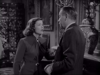 Movie still from “The Razor's Edge” (1946), directed by Edmund Goulding – A man and a woman talking to each other; Medium shot, Low angle