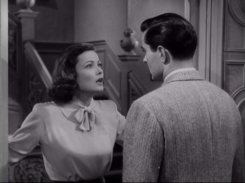 Movie still from “The Razor's Edge” (1946), directed by Edmund Goulding – A woman and a man are talking to each other; Medium shot, Over the shoulder angle